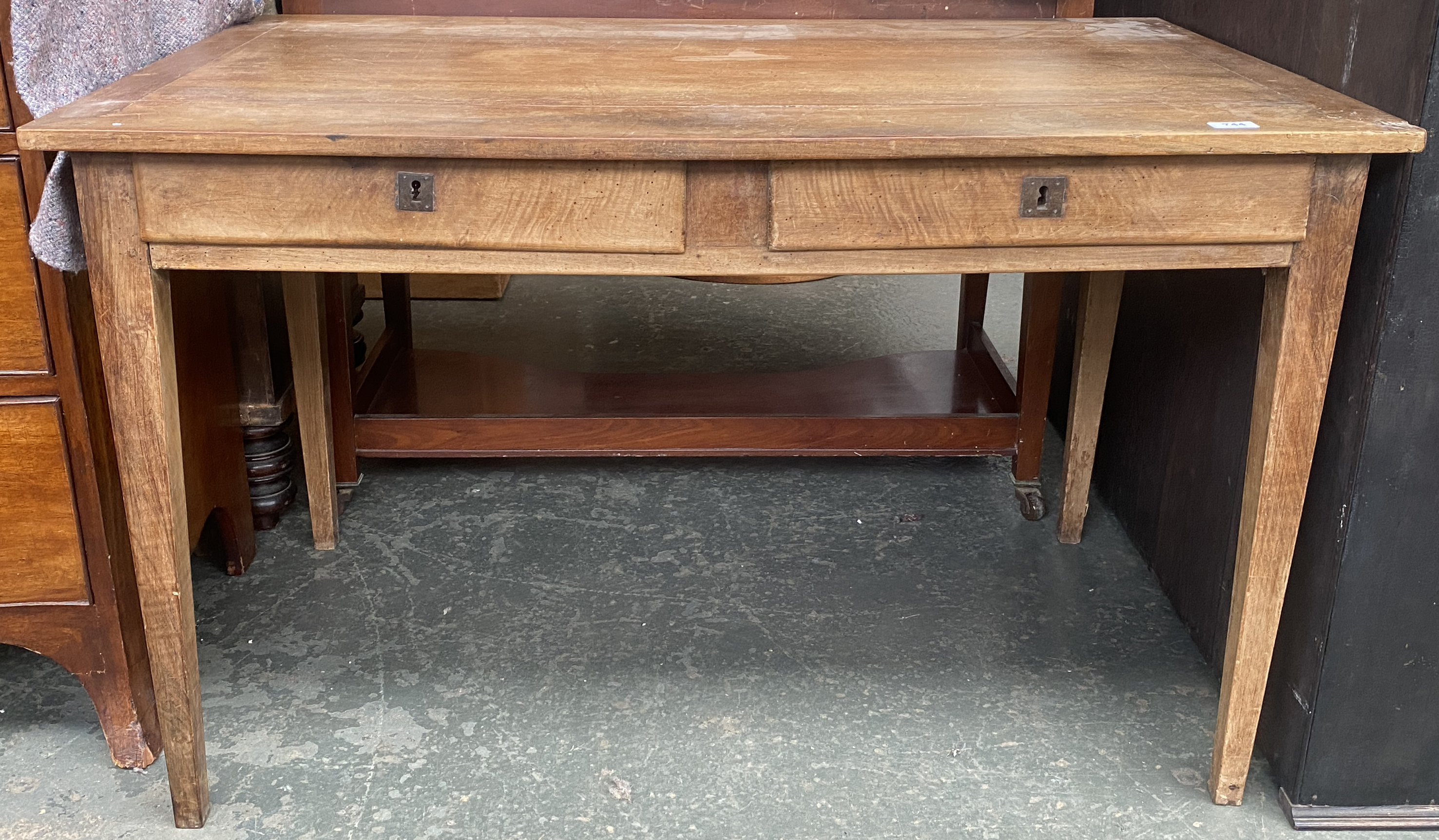 A fruitwood kitchen table, with two drawers, on square tapered legs, 114x72.5x71cmH