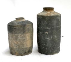 Two early terracotta storage jars, possibly 2000BC, 18cmH and 23cmH