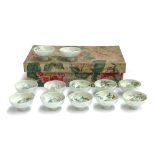 A set of twelve early 20th century Japanese porcelain novelty sake cups, each with moving turtle,