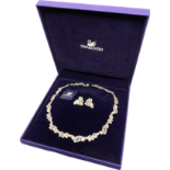 A boxed Swarovski 'Dream' necklace, model no. 851812, with matching clip-on earrings