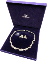 A boxed Swarovski 'Dream' necklace, model no. 851812, with matching clip-on earrings
