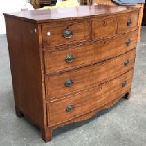 A Regency bowfront chest of three short over three long drawers on bracket feet, 122x60x102cmH