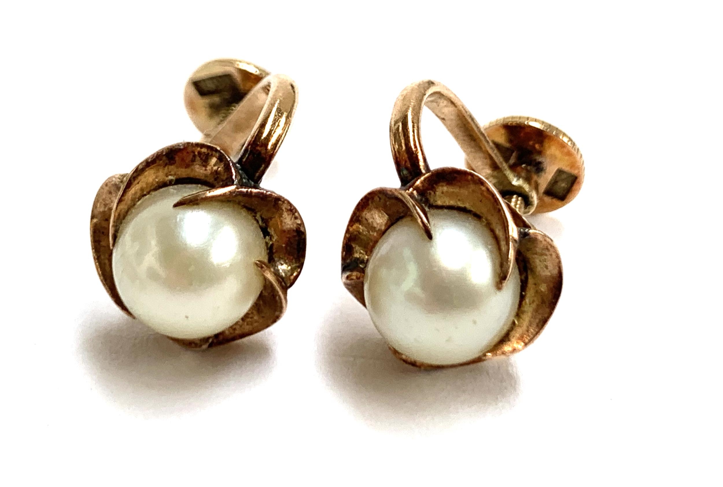 A pair of 18ct gold and pearl screw back earrings, stamped RAI, gross weight 4.1g; together with two - Image 2 of 3