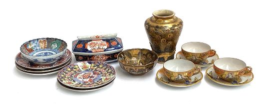 A collection of Japanese and Chinese ceramics, to include a Satsuma vase depicting Buddhist monks,