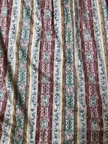 An exceptionally large curtain in an ornate pattern, lined; approx 215cm drop, 220cm width at