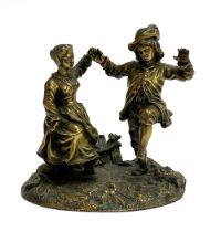 A late 19th/early 20th century bronze figure group of a dancing Dutch couple, 15.5cmH