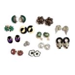 A quantity of costume clip on earrings to include 925 silver and mother of pearl modernist earrings;