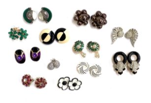 A quantity of costume clip on earrings to include 925 silver and mother of pearl modernist earrings;