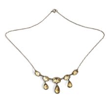 An early 20th century silver and citrine festoon necklace, 42cm long unclasped length