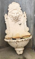 A cast iron lion mask garden fountain, approx 78cmH