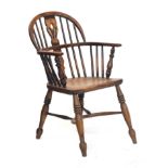A late 19th century ash and elm low splat back Windsor chair, on triple ring turned legs with