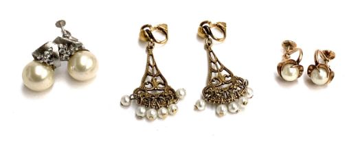 A pair of 18ct gold and pearl screw back earrings, stamped RAI, gross weight 4.1g; together with two