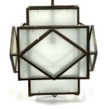 Interior design interest: a wrought metal and frosted glass Art Deco style geometric hanging lanter