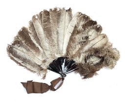 A large ostrich feather and faux tortoiseshell fan, in original box (af)