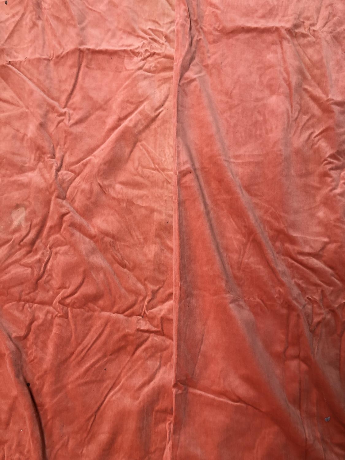 Five coral velvet curtains, lined; each approx 225cm drop, 110cm ungathered width; some fading, with