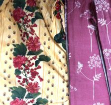 A pair of small yellow curtains with cherry and leaf design, lined, approx 47cm width at pinch pleat