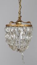 A cut glass mounted bell form light, with oval drops, 20th century, 24cm high; and another cut glass