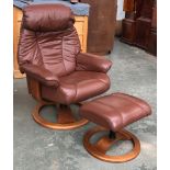 A 20th century Swedish Anderssons 20th reclining leather swivel chair with foot stool, bears label