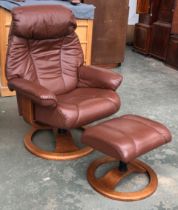 A 20th century Swedish Anderssons 20th reclining leather swivel chair with foot stool, bears label