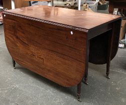 A George III mahogany drop leaf table, having six legs, 115x62x72cmH, when extended approx. 175cmL