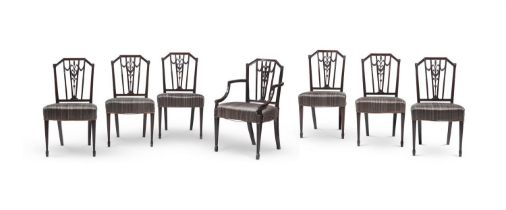 A set of seven Georgian revival dining chairs, late 19th century, to include one armchair, with