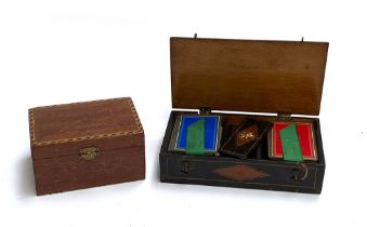 A wood cased bridge set, the wooden box with painted detail, 20cmW; together with a blue velvet