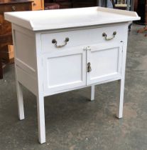 A white painted washstand with single drawer and cupboard below, small three quarter galleried