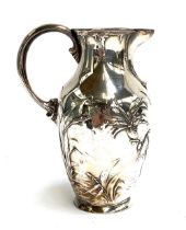 An Art Nouveau/Jugendstil WMF (Württembergische Metallwarenfabrik) silver jug, decorated with a