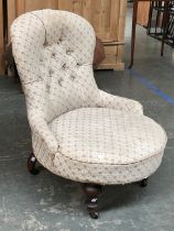 A button back Victorian bedroom chair, turned front legs and ceramic casters, stamped J Mills