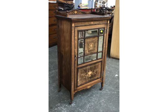 A late Victorian rosewood cabinet, with marquetry and bevelled mirrored door opening to shelves,