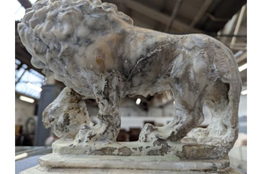 A pair of carved marble sculptures in the form of Medici lions with orbs, 24cm long - Image 10 of 13