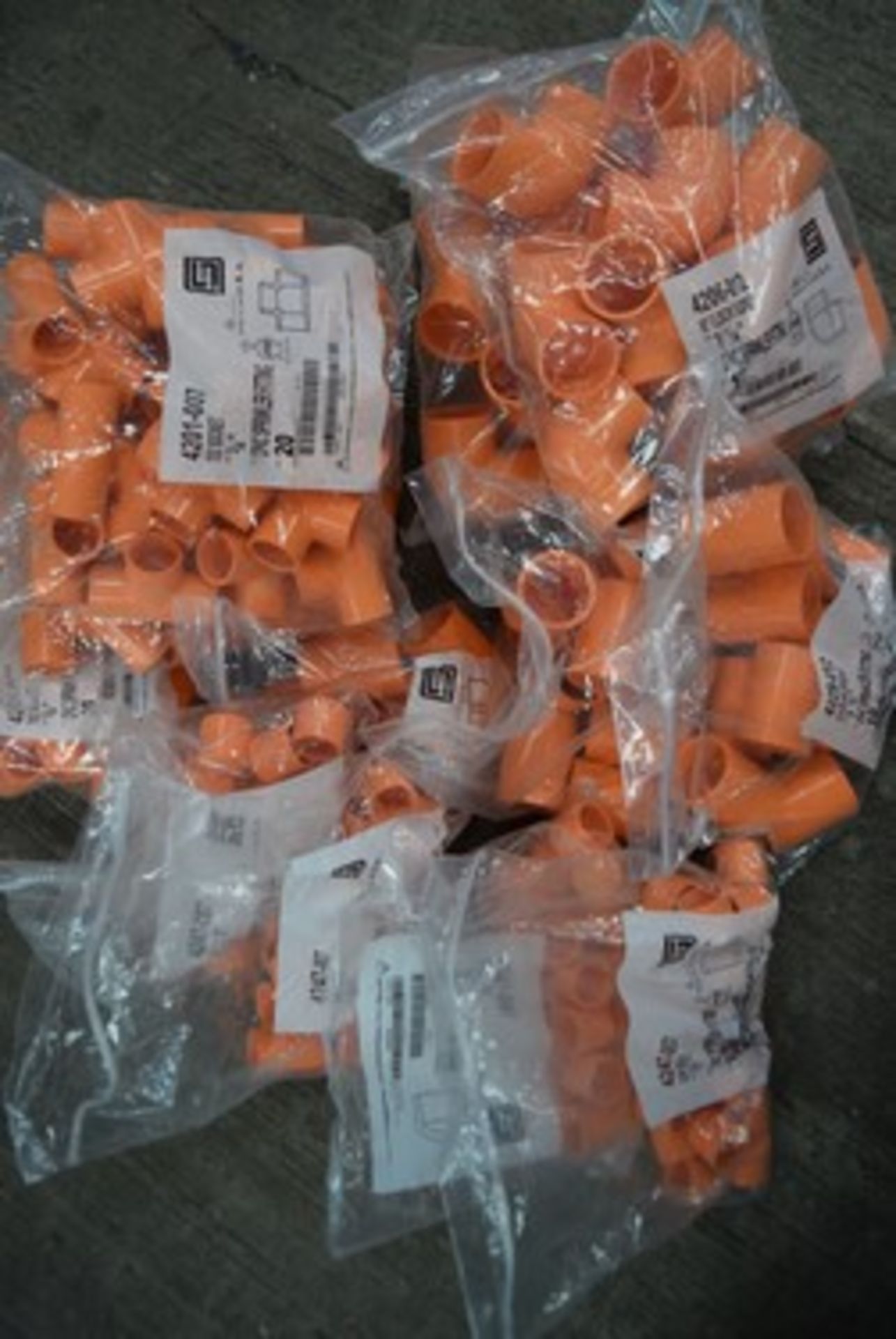 A good selection of Spears Flameguard sprinkler system CPVC pipe fittings, including tees, elbows,