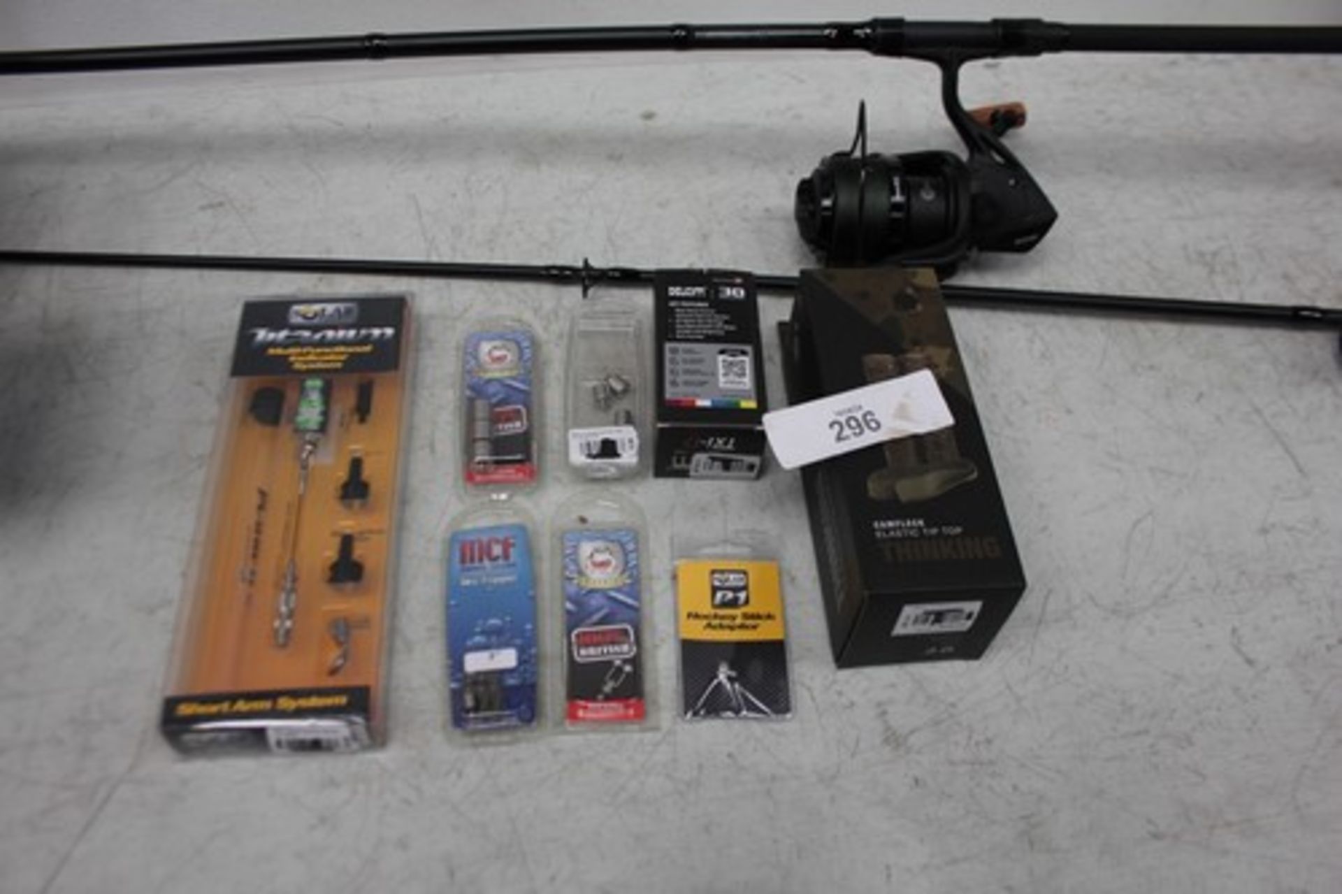 A selection of fishing equipment, including Sonik Vader 8000RS reel, Solar multifunction indicator