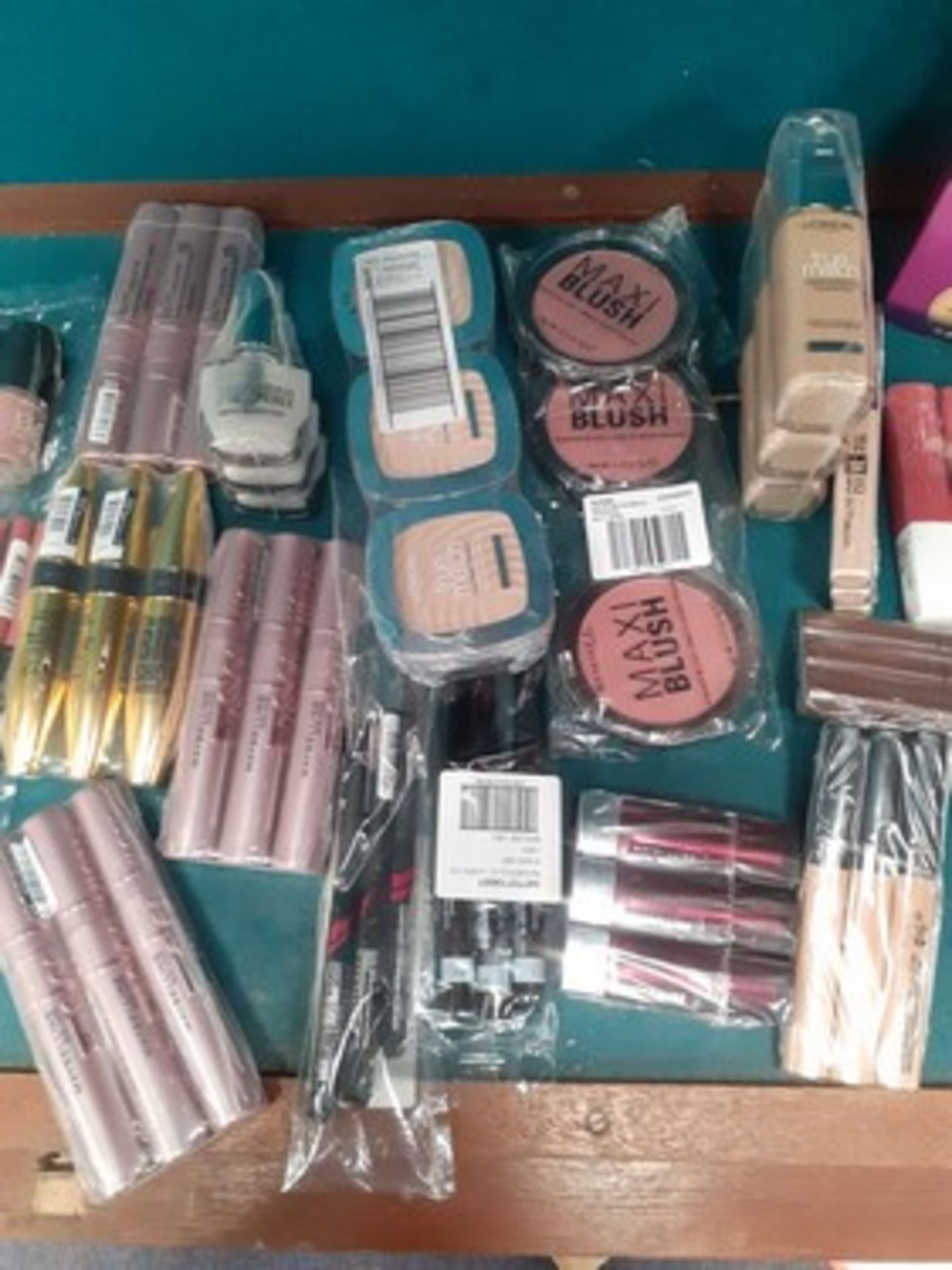 A good quantity of cosmetics by Maybelline, L'Oreal and Rimmel including, mascara, foundation,