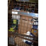 A cage containing a good selection of medical products, including First Aid kits, assorted pads,