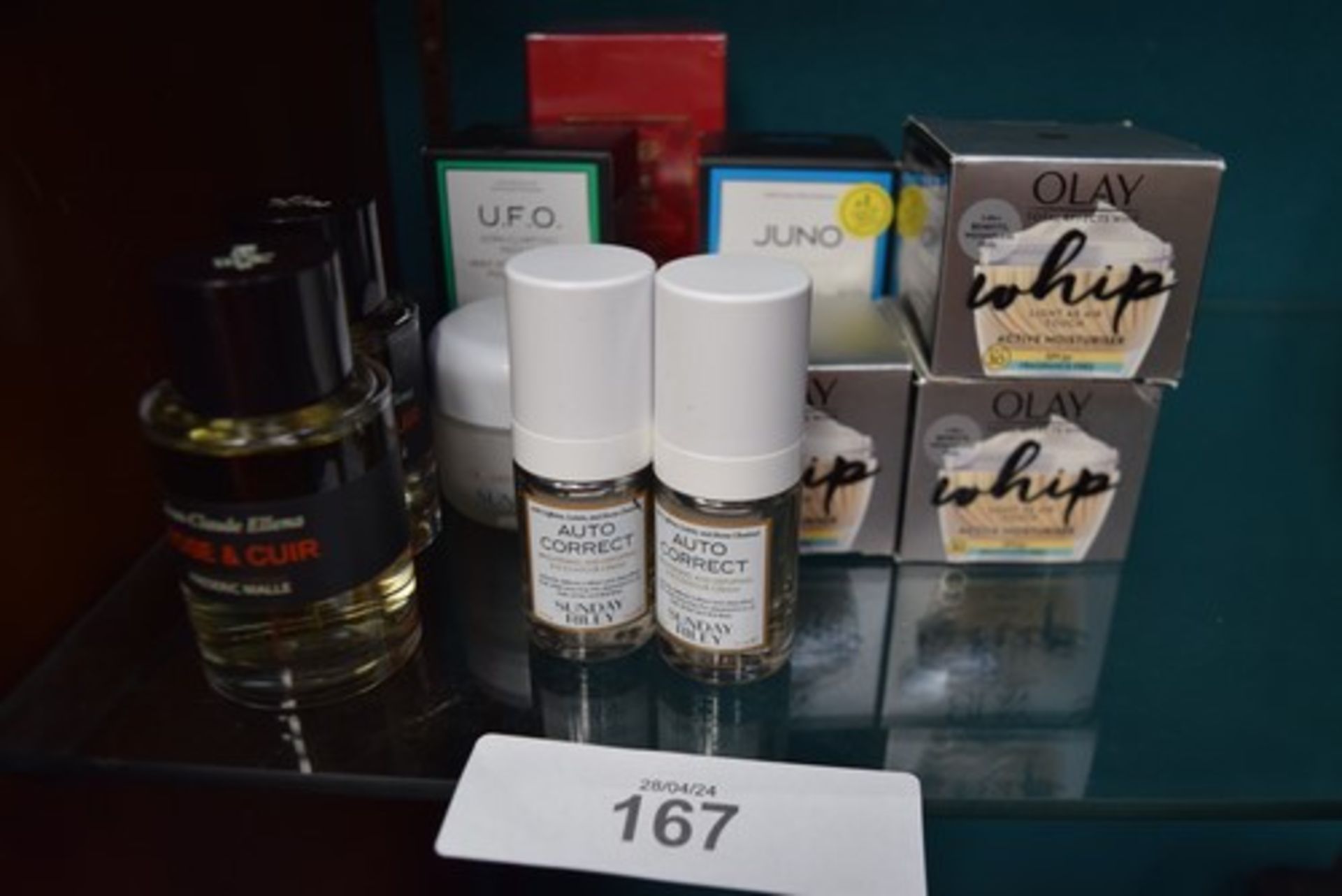 A small selection of beauty products, including 3 x 5ml tubs of Olay, whip light as air touch active