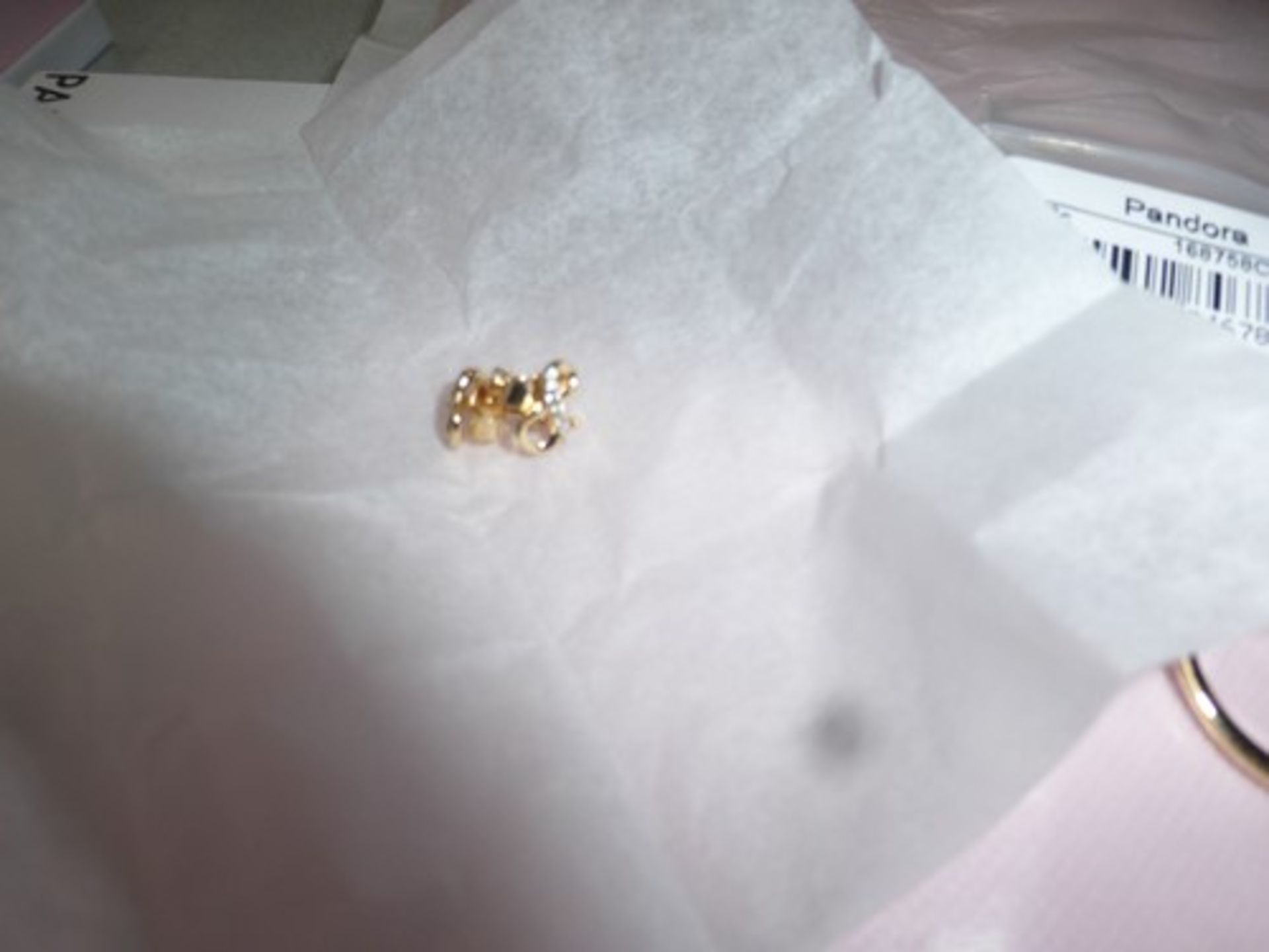 3 x items of Pandora jewellery, comprising of 1 x pair of infinity stud earrings, 1 x diamond