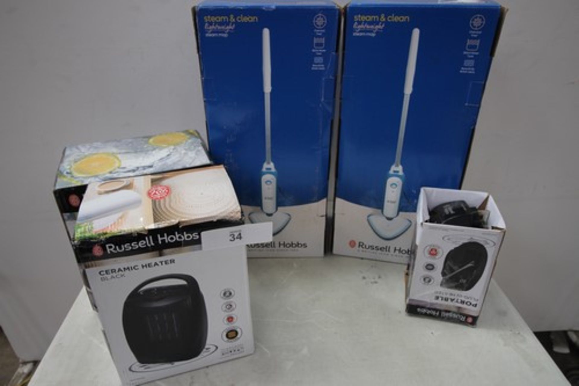 5 x Russell Hobbs products, including light weight steam cleaners, ceramic heaters and 4L mini