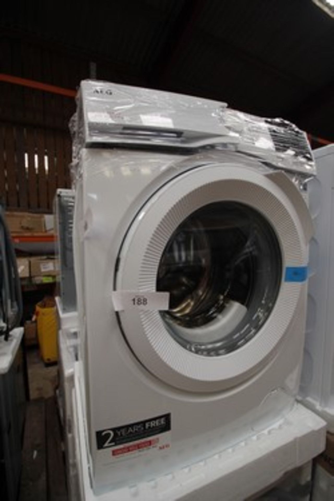 1 x AEG 8kg washing machine, Model 914913125, loose top panel, damaged control panel and dented