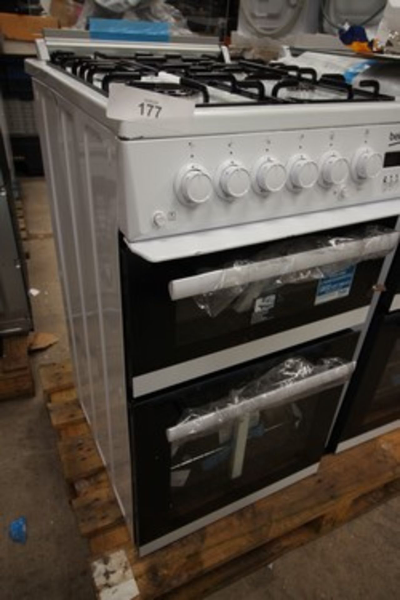 1 x Beko gas double oven and hob, Model EDG507W, dented top panel (RHS), dented and scratched heat
