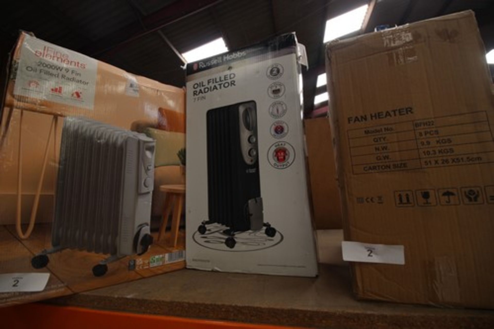 A selection of heaters, including Russell Hobbs 7 fin oil filled heaters and 8 x Belaco fan heaters,