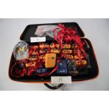 A set of 19 x Okayo WT-300 tour guide modules in carry case, comprising 2 x transmitters and 17 x