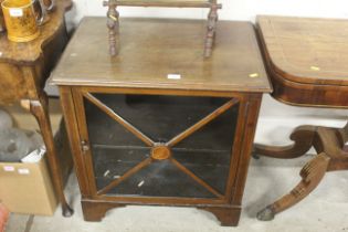 An antique adapted mahogany and inlaid glass front