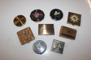A box of various compacts to include musical examp