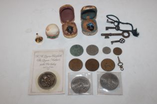 A box containing various coinage, old keys etc.
