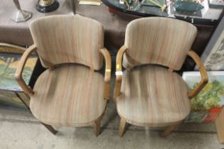 A pair of Shepherd & Hedger Art Deco oak upholster