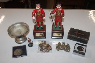 Two painted models of the Yeoman of the Guard, one