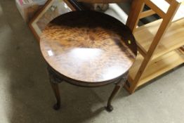 A Maple & Co. mahogany circular topped table raise