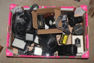 A box of various cameras and equipment