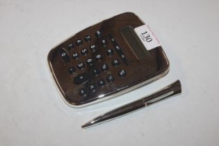 A calculator and matching pen